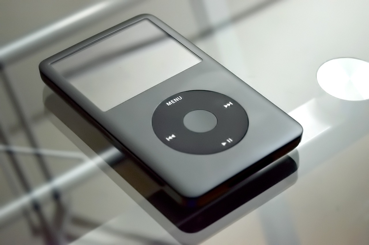 how to add a mp3 file to a web page and play music when user is loading it